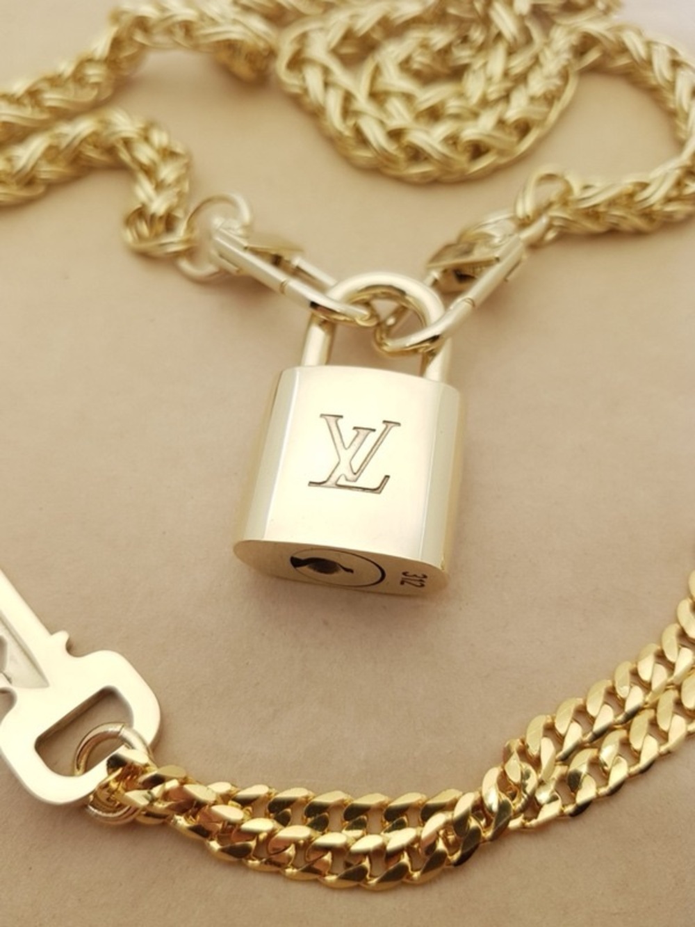 Louis Vuitton Authentic Lock and Key #322 with 16” Gold Link Necklace